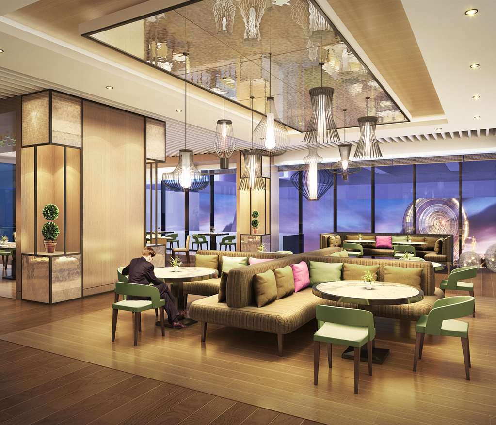 Hilton Garden Inn Ningbo Restaurante foto